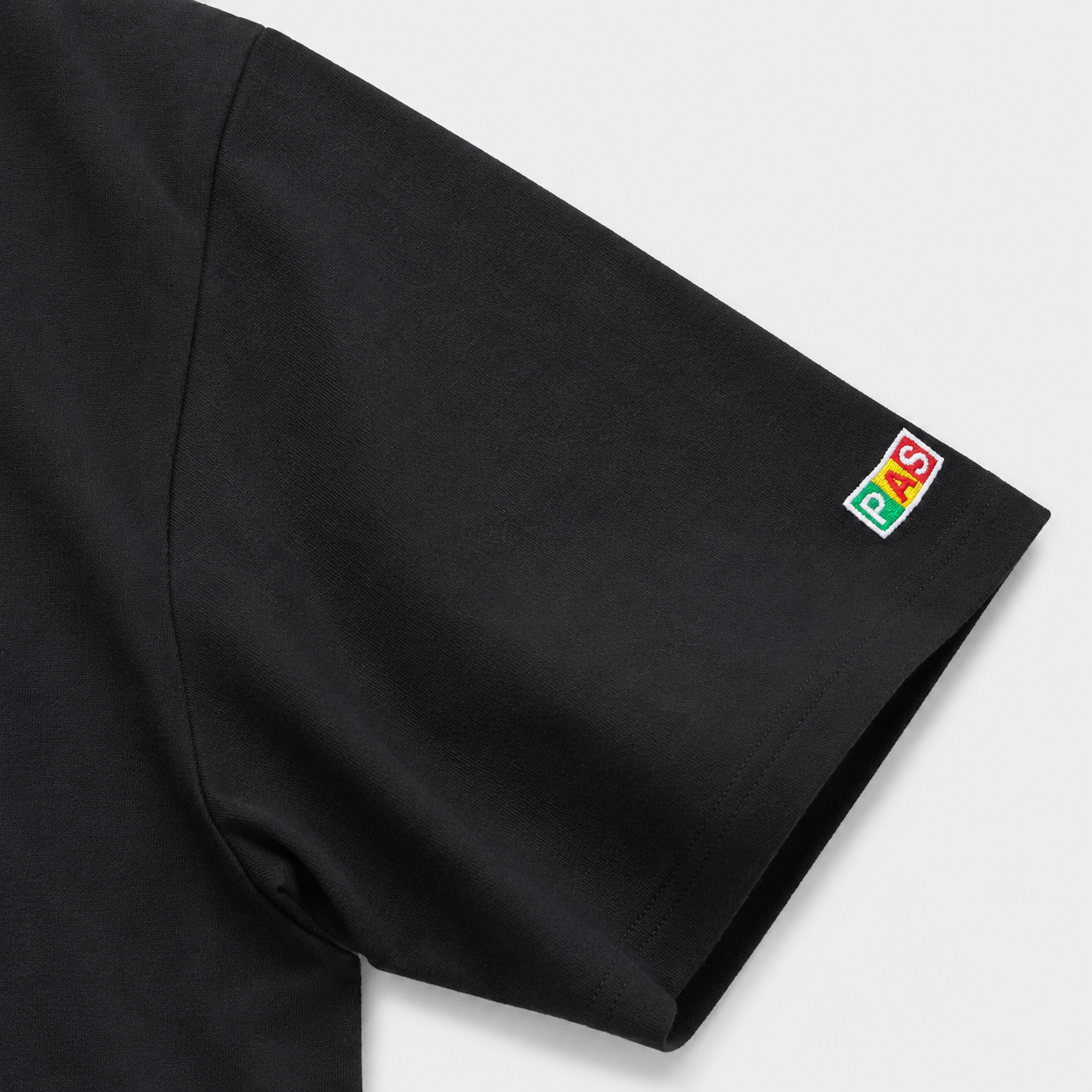 PAS x Portugal Seleção das Quinas black tee – embroidered PAS sleeve patch in Portugal colors