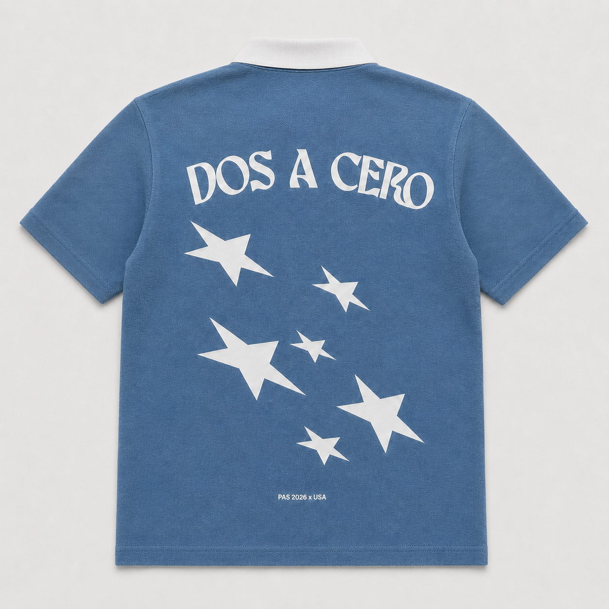 PAS x USA Dos A Cero blue slim fit polo – embroidered PAS x USA arch on front, Dos A Cero stars graphic on back, PAS patch on sleeve